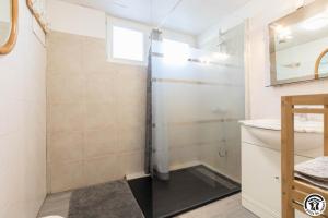 a bathroom with a shower and a sink at Vacances garonne toulouse in Saubens +19 photos