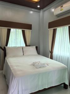Postel nebo postele na pokoji v ubytování Yurich Hotel