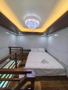 Postel nebo postele na pokoji v ubytování Yurich Hotel
