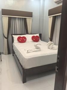 Postel nebo postele na pokoji v ubytování Yurich Hotel