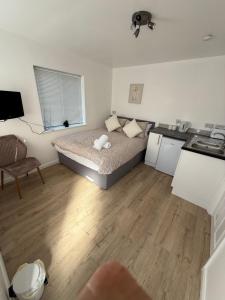 Ένα ή περισσότερα κρεβάτια σε δωμάτιο στο Colne cabin