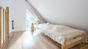Postel nebo postele na pokoji v ubytování Słoneczne Apartamenty, Sun & Snow