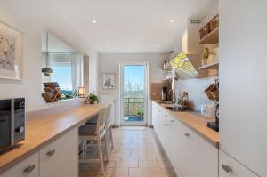 Eldhús eða eldhúskrókur á Ferienwohnung Panorama - Suite