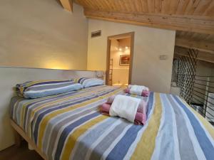 Ένα ή περισσότερα κρεβάτια σε δωμάτιο στο Casa Gabriella Lucca