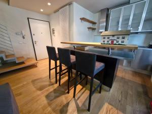 Η κουζίνα ή μικρή κουζίνα στο Casa Gabriella Lucca +5 φωτογραφίες