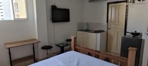 Kuchyň nebo kuchyňský kout v ubytování apartaestudio economico luna azul rodadero + 2 fotografie