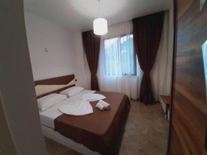 Postel nebo postele na pokoji v ubytování Villa Se