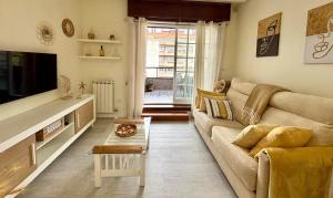 TV a/nebo společenská místnost v ubytování Apto Holibai Luceira Baiona, Galicia Vacaciones para Parejas o Familia