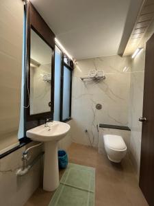 Kúpeľňa v ubytovaní Kuber Suites
