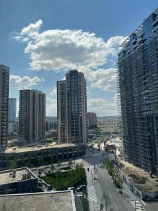an aerial view of a city with tall buildings at BW St Lui Apartment in Belgrade