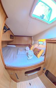 Postel nebo postele na pokoji v ubytování Enjoy Sailing Experience