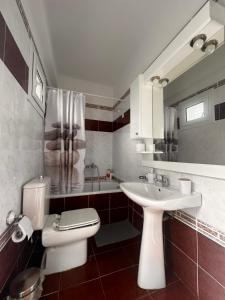 Ένα μπάνιο στο Villa Liolios