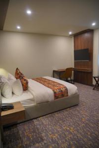 Destination Hotel Gilgit客房内的一张或多张床位