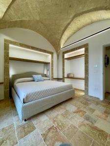 Ένα ή περισσότερα κρεβάτια σε δωμάτιο στο Villa Bolla