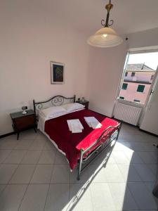 En eller flere senge i et værelse på Appartamento Orfeo