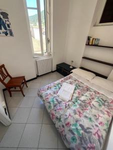 En eller flere senge i et værelse på Appartamento Orfeo + 2 billeder