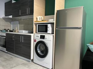 Kuchyň nebo kuchyňský kout v ubytování Lefteris Apartment