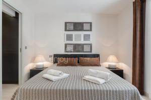 Posteľ alebo postele v izbe v ubytovaní " Paradis en Rez de jardin " Standing - Vue Mer - piscine privée + 18 fotografií