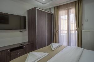 Postelja oz. postelje v sobi nastanitve Hotel Pavlović