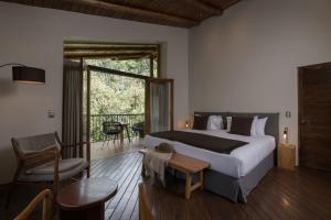 Andenia Boutique Hotel, Sacred Valley 객실 침대