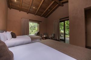 Andenia Boutique Hotel, Sacred Valley 객실 침대