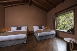 Andenia Boutique Hotel, Sacred Valley 객실 침대