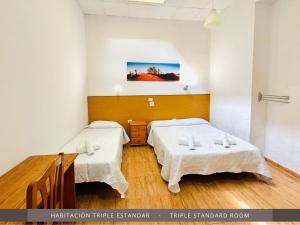 Hotel Kasa客房内的一张或多张床位