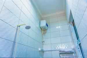 Phòng tắm tại KC Executive Lodge +21 ảnh