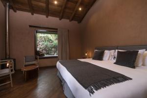 Andenia Boutique Hotel, Sacred Valley 객실 침대