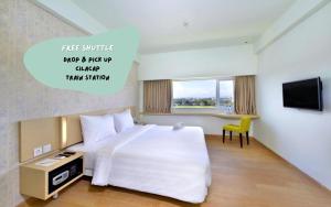 Μια τηλεόραση ή/και κέντρο ψυχαγωγίας στο Whiz Prime Hotel Sudirman Cilacap
