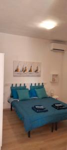 Ένα ή περισσότερα κρεβάτια σε δωμάτιο στο Apt in Villa Serra