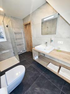 Ein Badezimmer in der Unterkunft Wallfahrtswirt