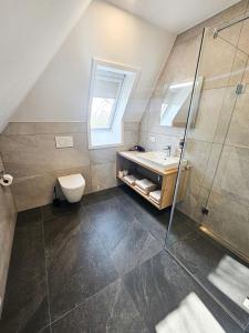 Ein Badezimmer in der Unterkunft Wallfahrtswirt