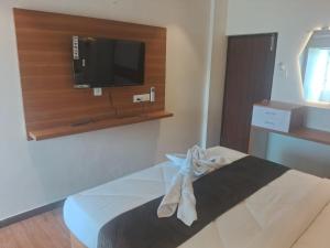 Postel nebo postele na pokoji v ubytování Hotel chela