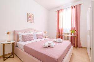 Postel nebo postele na pokoji v ubytování Deva Room