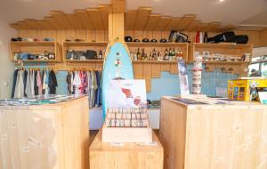 a surfboard is on display in a store at LOGIS HOTEL - La Petite Rade in Le Havre