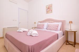 Postel nebo postele na pokoji v ubytování Deva Room