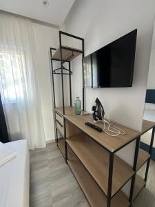 TV a/nebo společenská místnost v ubytování IO's Apartments
