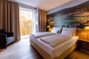 Voodi või voodid majutusasutuse Hotel Stainzerhof toas