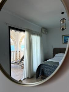 Postel nebo postele na pokoji v ubytování Hotel Vila Tina