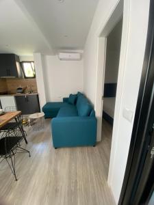 Kuchyň nebo kuchyňský kout v ubytování IO's Apartments