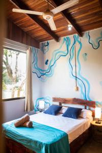 Postel nebo postele na pokoji v ubytování Argdivan Beach Hostel