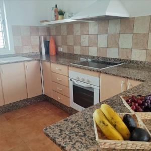 Kuchyň nebo kuchyňský kout v ubytování Maras House, oasis de paz