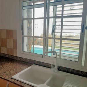 Bazén v ubytování Maras House, oasis de paz nebo v jeho okolí