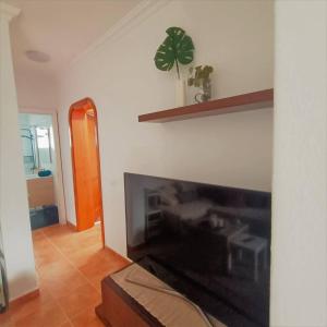 TV a/nebo společenská místnost v ubytování Maras House, oasis de paz