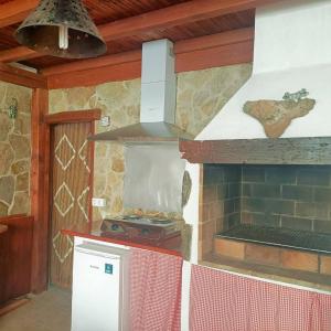 Kuchyň nebo kuchyňský kout v ubytování Maras House, oasis de paz
