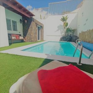 Bazén v ubytování Maras House, oasis de paz nebo v jeho okolí