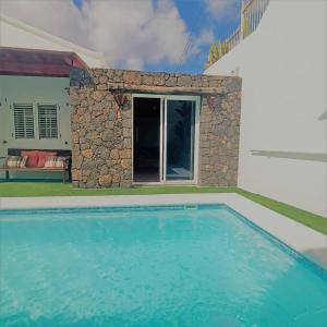 Bazén v ubytování Maras House, oasis de paz nebo v jeho okolí
