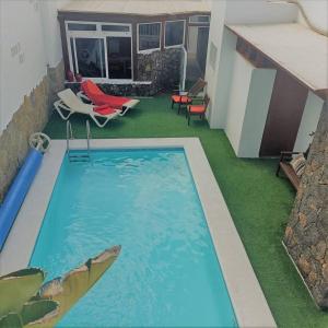 Bazén v ubytování Maras House, oasis de paz nebo v jeho okolí
