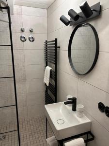 Ένα μπάνιο στο Ferienwohnung Nordwind